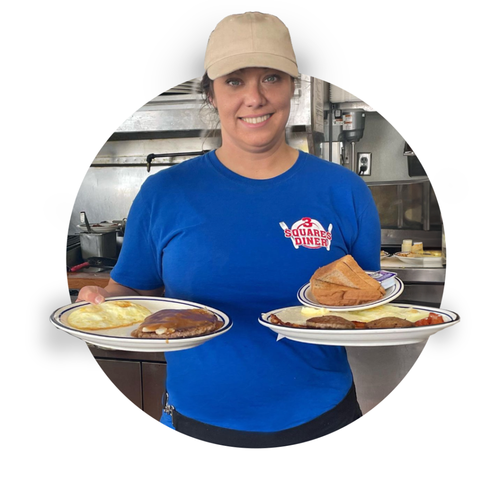 3 Squares Diner waitress serving up breakfast plates with a smile